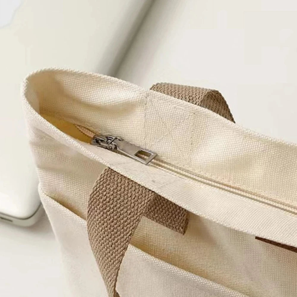 UrbanEase™ Canvas Tote – "Effortless Sophistication in Every Stitch"