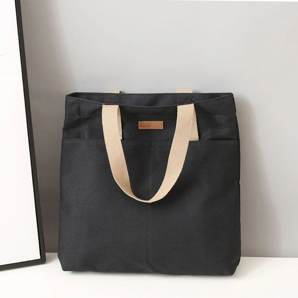 UrbanEase™ Canvas Tote – "Effortless Sophistication in Every Stitch"