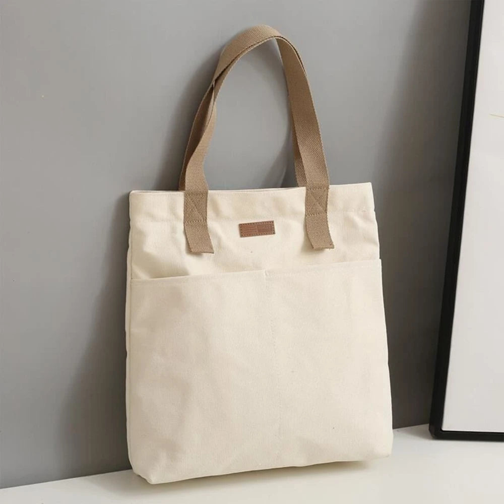 UrbanEase™ Canvas Tote – "Effortless Sophistication in Every Stitch"