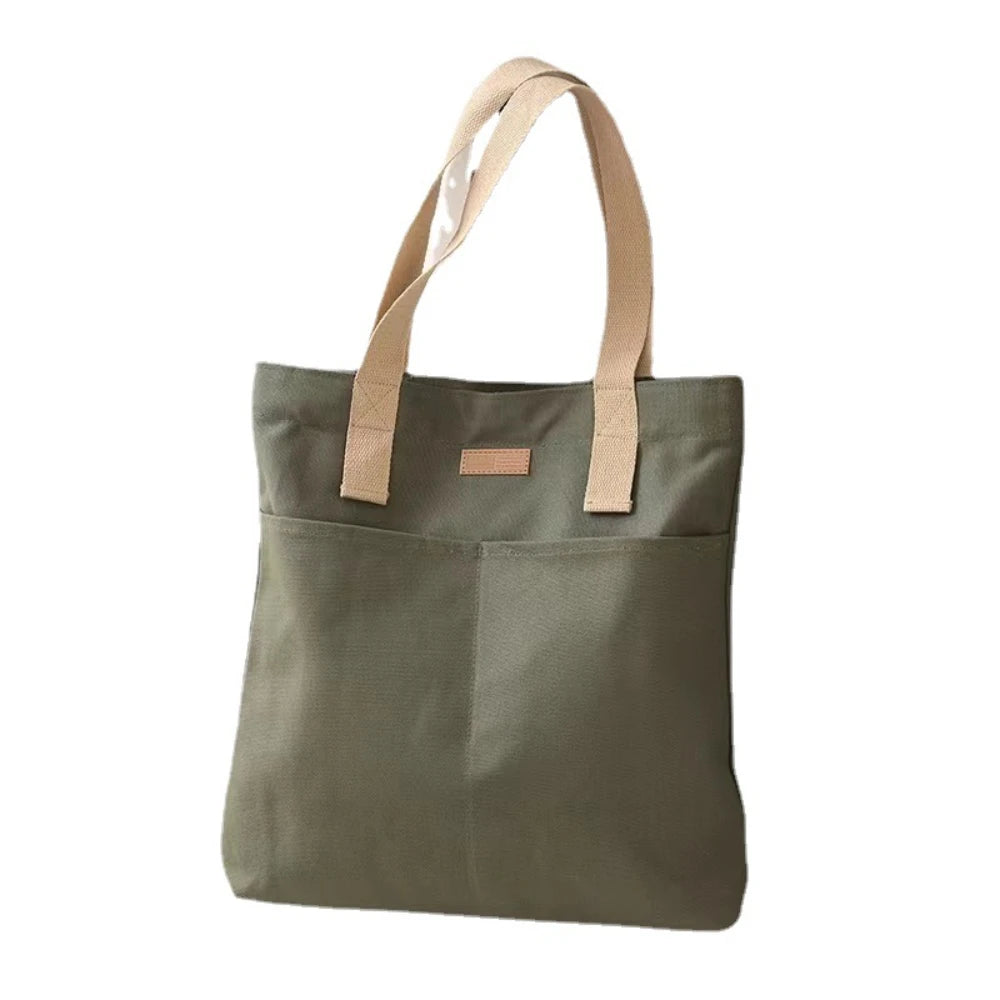 UrbanEase™ Canvas Tote – "Effortless Sophistication in Every Stitch"