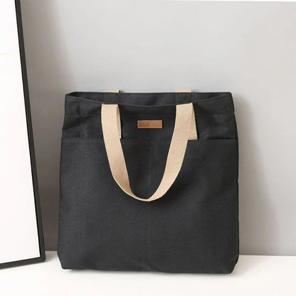 UrbanEase™ Canvas Tote – "Effortless Sophistication in Every Stitch"