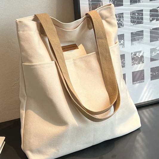 UrbanEase™ Canvas Tote – "Effortless Sophistication in Every Stitch"