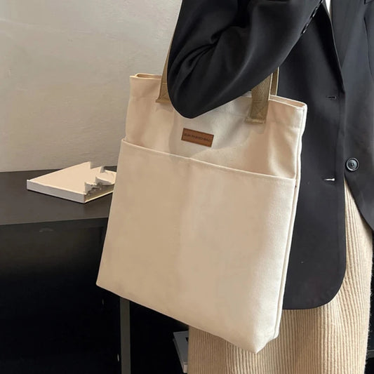 UrbanEase™ Canvas Tote – "Effortless Sophistication in Every Stitch"